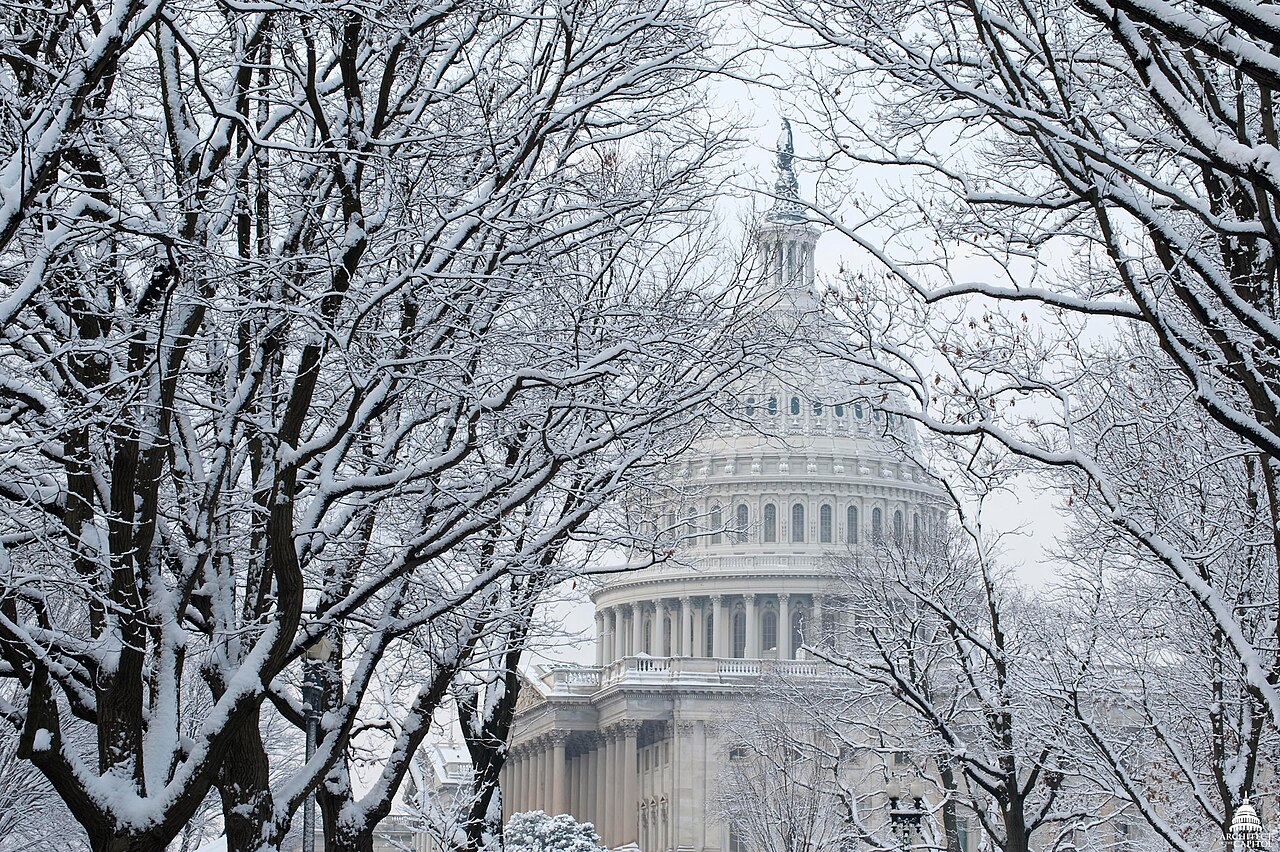 U.S. Capitol dome covered in snow during winter in Washington DC