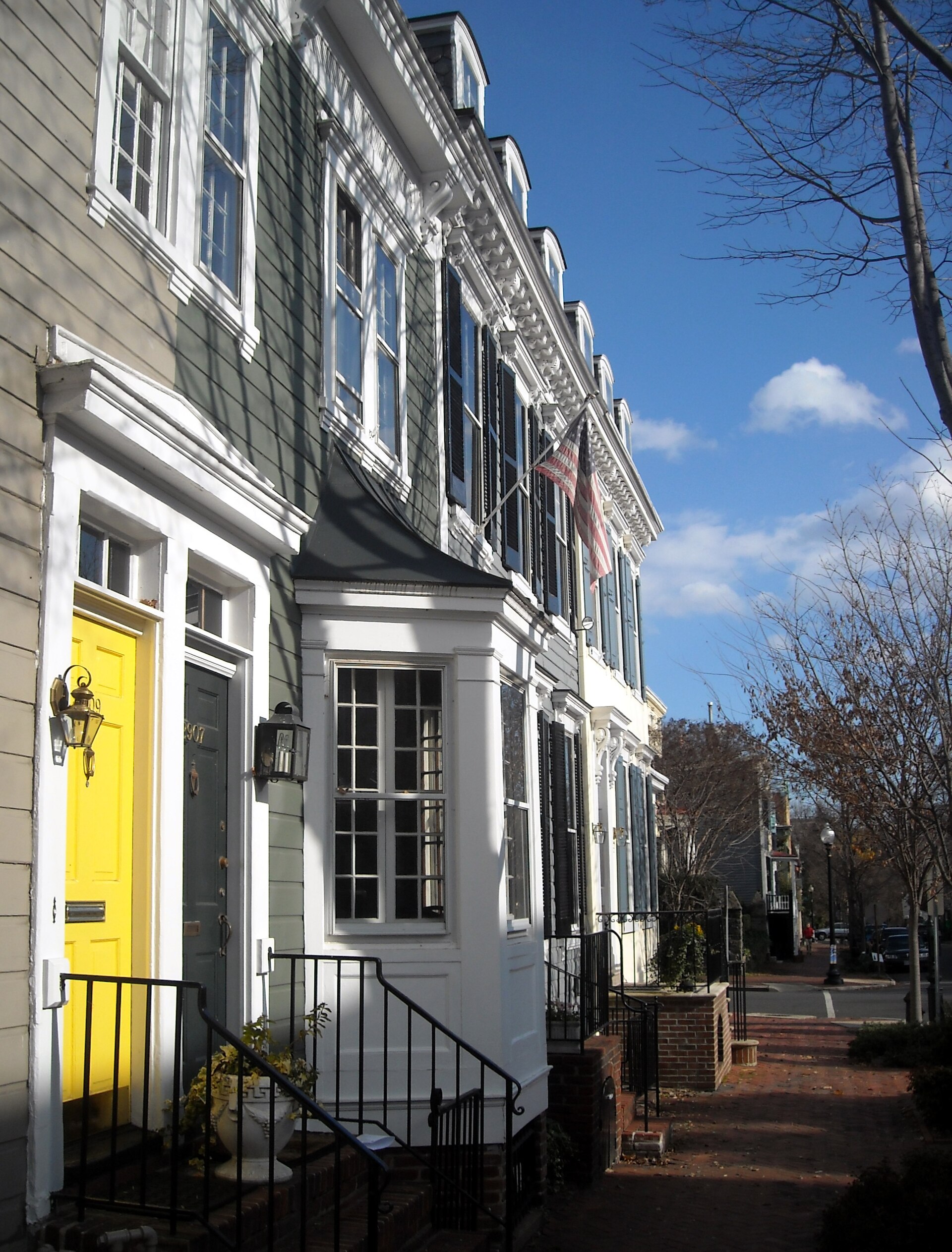 Historic row houses and brick sidewalk on N Street in Georgetown, Washington DC