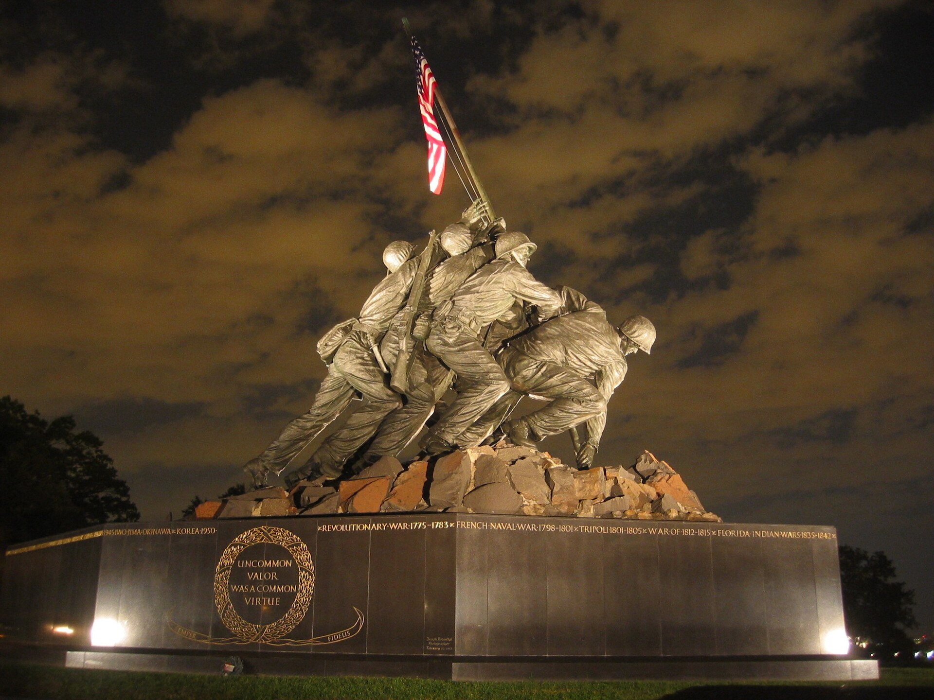 The Marine Corps War Memorial (Iwo Jima Memorial) illuminated at night in Arlington, near Washington DC