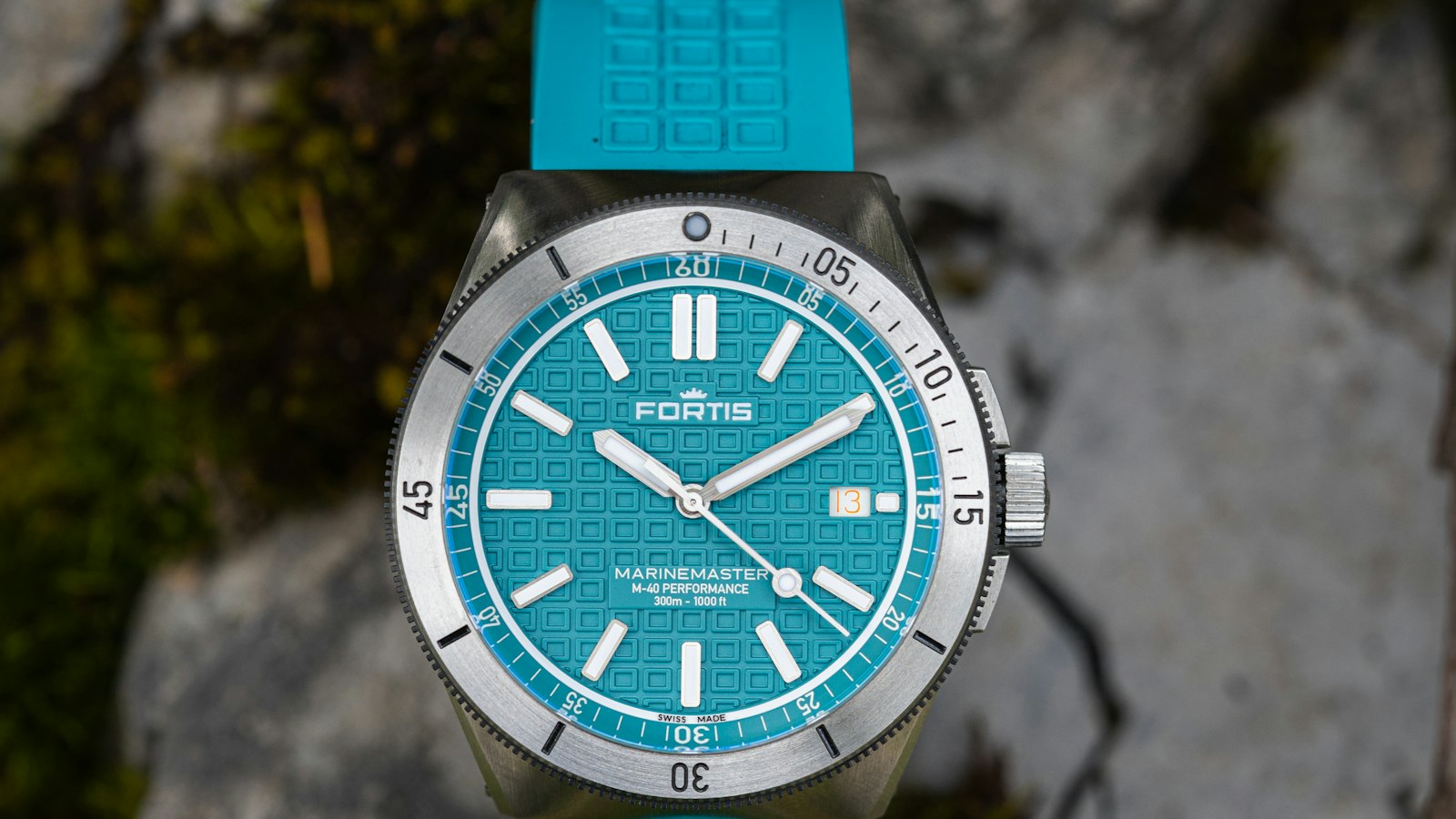 Outdoor watch resting on a rock