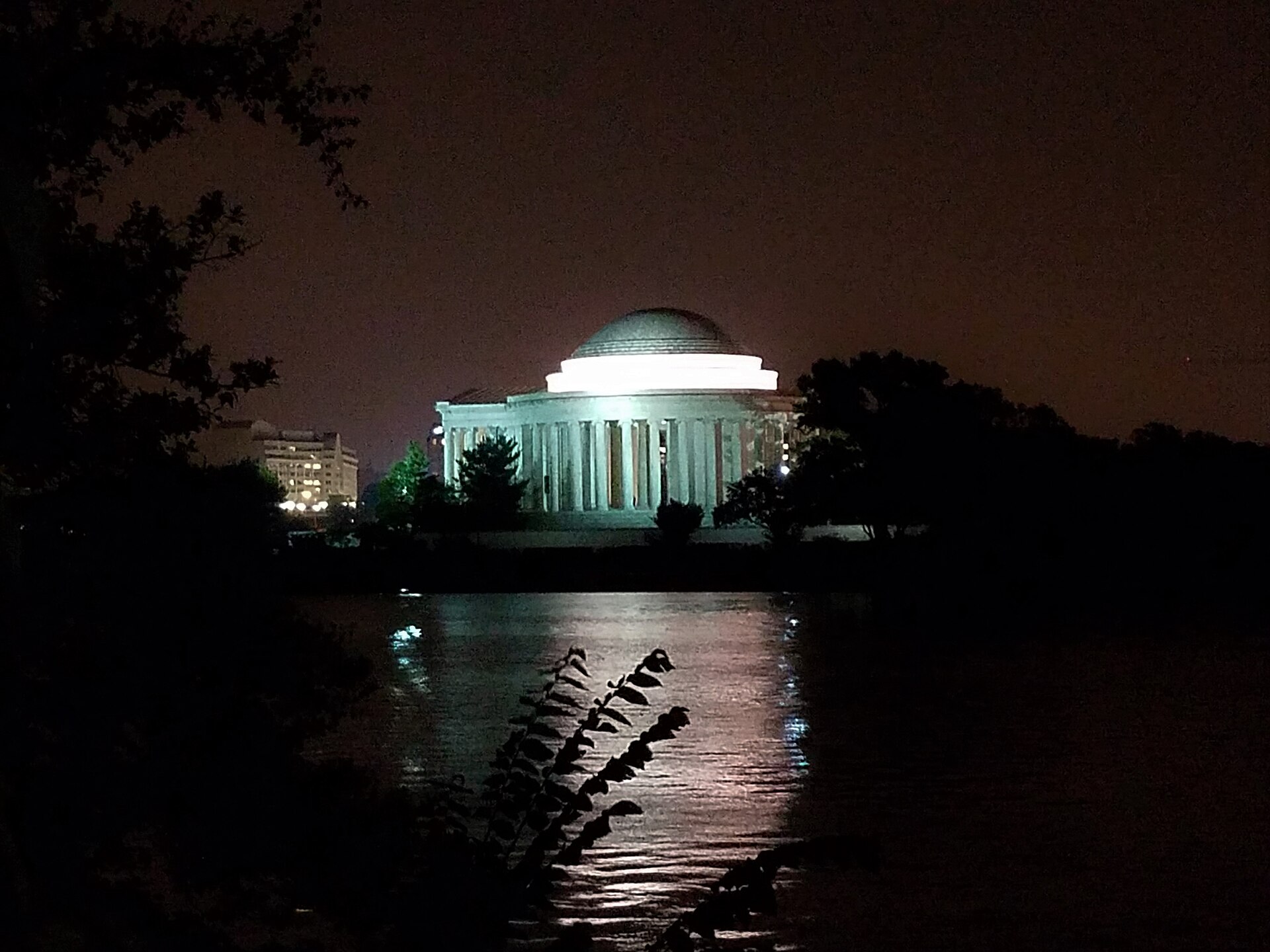 Washington DC memorials illuminated at night along the Tidal Basin, showing things to do in Washington DC at night